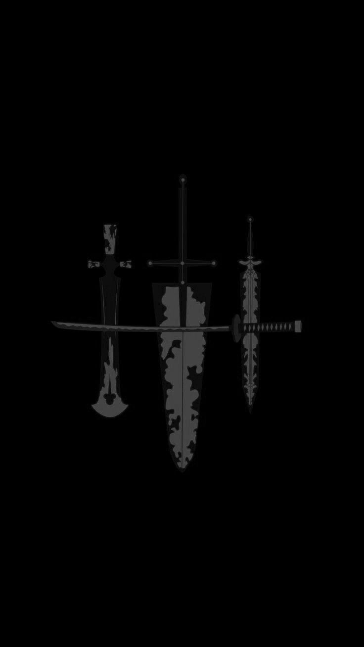 an image of three different swords in the dark