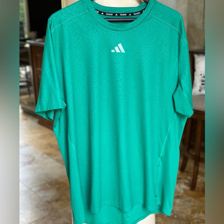 Never Worn. Brand New. Men’s Adidas Green Tee. Size Xl Adidas Green Sports T-shirt, Adidas Green T-shirt For Sports, Adidas Green Crew Neck T-shirt, Adidas Green Short Sleeve T-shirt, Green Adidas Crew Neck T-shirt, Adidas Green Short Sleeve Tops, Adidas Tee, Green Tee, Adidas Shirt