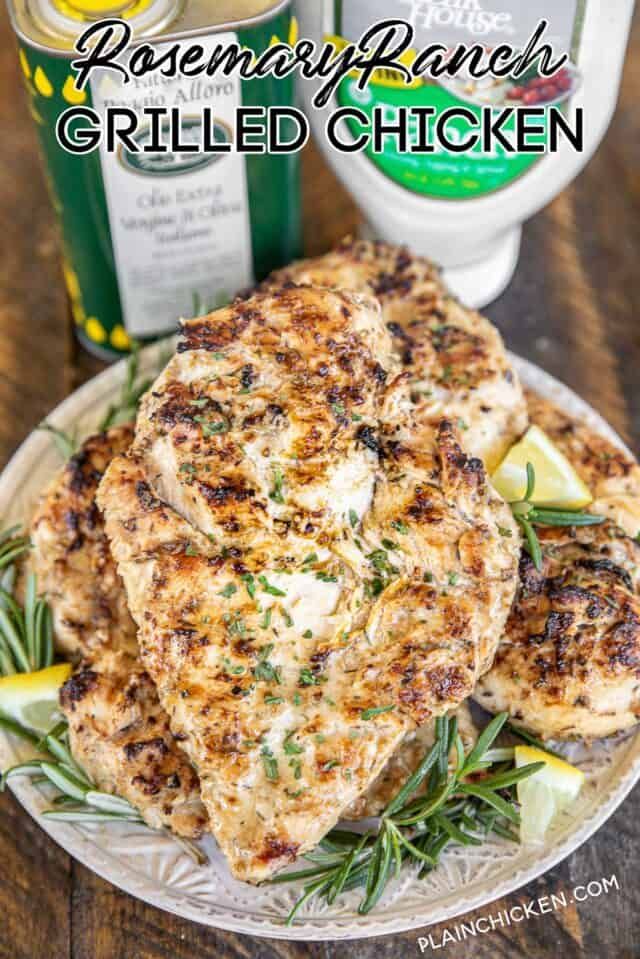 grilled chicken on a plate with rosemary parmesan sauce