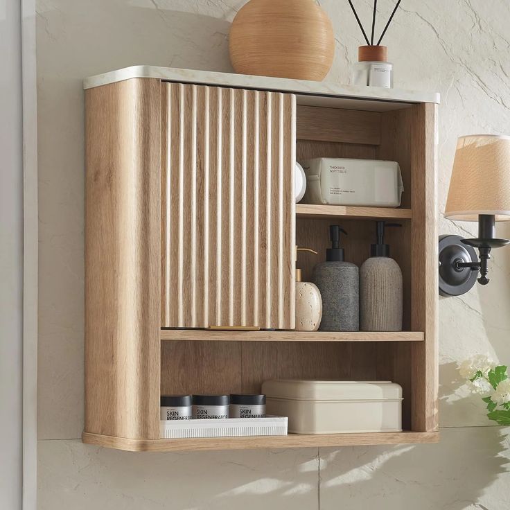 a wooden shelf that has some items on it