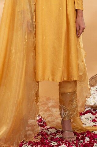 Yellow straight kurta with side kalis and placement floral embroidery. Paired with a pant with embroidered hem and dupatta. - Aza Fashions Chanderi Pants For Wedding And Eid, Elegant Festive Pants With Sheer Dupatta, Unstitched Bottoms With Zari Work For Wedding, Wedding Bottoms With Dupatta For Eid, Anarkali Bottoms With Resham Embroidery For Wedding, Festive Silk Bottoms For Weddings, Dabka Work Pants For Wedding And Eid, Wedding Pants With Dabka Work For Eid, Eid Wedding Pants With Dabka Work