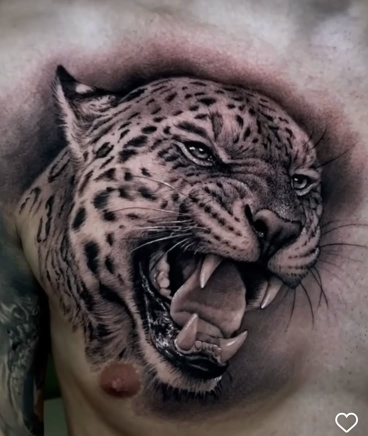 a man's chest with an image of a leopard on it