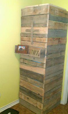 an old wooden pallet has been turned into a bookcase