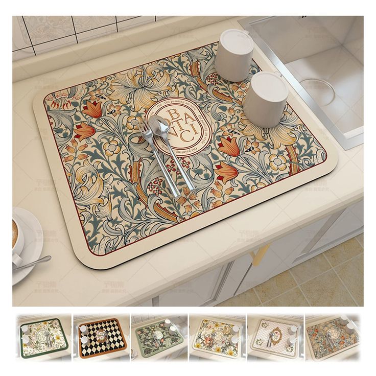 the kitchen floor mat is decorated with an ornate design and monogrammed coffee mugs