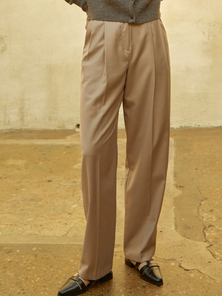 Editor's NotesThese pants have a high rise, standard fit with double pintuck detail through the front. They have structured silhouette with tapered hem that add to the chic and modern mood. - High rise- Standard fit- Ankle length- Tapered hem- Double pintuck details through front- Hook and button closureMeasurements(in.)Size (S/M)- Length: 39.17 in / 39.17 in - Waist: 13.78 in / 14.37 in - Hip: 18.70 in / 19.29 in - Thigh: 12.60 in / 13.19 in - Rise: 12.60 in / 12.60 in - Hem: 7.87 in / 8.27 in * Model info: Height 5' 5, wearing Size S Composition & Care- 65% Polyester, 35% Rayon - Dry Cleaning or Hand Wash Designer- by 320SHOWROOM Elegant Beige Wide Leg Pants With Straight Hem, Chic Beige Dress Pants With Pressed Crease, Beige Bottoms With Pressed Crease And Straight Hem, Chic Beige Pants With Pressed Crease, Chic Beige Pants With Straight Hem, Beige Straight Hem Pants For Office, Elegant Beige Bottoms With Straight Hem, Chic Beige Bottoms With Pressed Crease, Beige Straight Hem Bottoms For Workwear