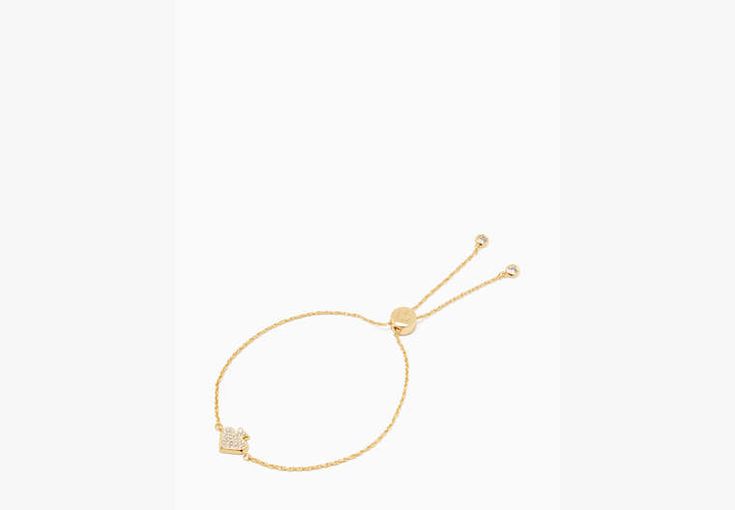 We say stack your bracelets to make a statement. This makes the first one in your pile. Or the 100th. | Kate Spade Everyday Spade Pave Slider Bracelet, Clear/gold Adjustable Gold Charm Bracelet For Everyday, Gold Charm Bracelet With Adjustable Length As Gift, Gold Charm Bracelet With Adjustable Length, Gold Bracelet With Adjustable Length As Gift, Adjustable Gold-tone Charm Bracelet With Jubilee Details, Adjustable Gold-tone Bracelet For Anniversary, Adjustable Gold-tone Jubilee Charm Bracelet, Kate Spade Jewelry With Adjustable Chain For Gifts, Adjustable Gold Plated Heart Bracelet For Everyday