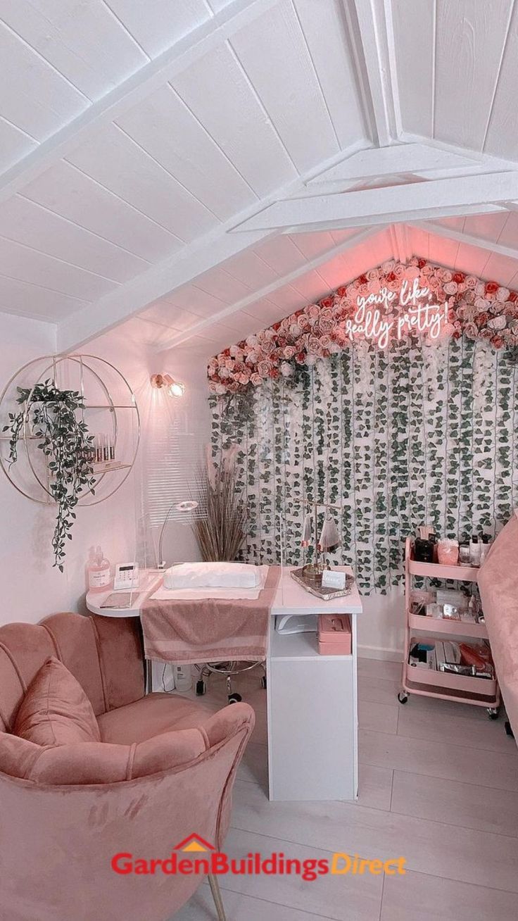 a bedroom with pink furniture and flowers on the wall