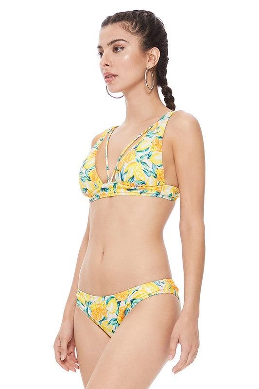 Lemon print halter two piece style features strappy details in the front, removable pads, adjustable shoulder straps, hook at back, and full coverage bottom. Textured materials. Print / Pattern: lemon print Fit: regular Embellishment: textured materials Neck Line: V-neckline Lining: yes Made In: ChinaFabric Contents: 82% NYLON, 18% SPANDEX Stretch fabric Non-sheer fabric Care Instructions: Hand wash cold, flat to dry or hang to dry. Do not bleach, do not dry clean.Size Measurement (inch): S: 32.0-34.0 (Bust), 24.0-26.0 (Waist), 32.0-34.0 (Hips), null (Length) M: 34.0-36.0 (Bust), 26.0-28.0 (Waist), 34.0-36.0 (Hips), null (Length) L: 36.0-38.0 (Bust), 28.0-30.0 (Waist), 36.0-38.0 (Hips), null (Length) Romper Swimsuit, Pants Gift, Lemon Print, La Girl, Graphic Tops, Sheer Fabrics, Print Pattern, Shoulder Straps, Sweater Hoodie