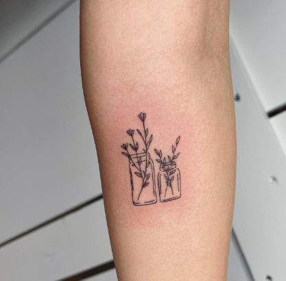 Floral Pots Tiny Girl Tattoo Idea Tiny Colored Tattoos, Plant In A Pot Tattoo, Plant Pot Tattoo, Pots Tattoo, Potted Plant Tattoo, Flower Pot Tattoo, Pot Tattoo, Kitten Tattoo, Small Tats