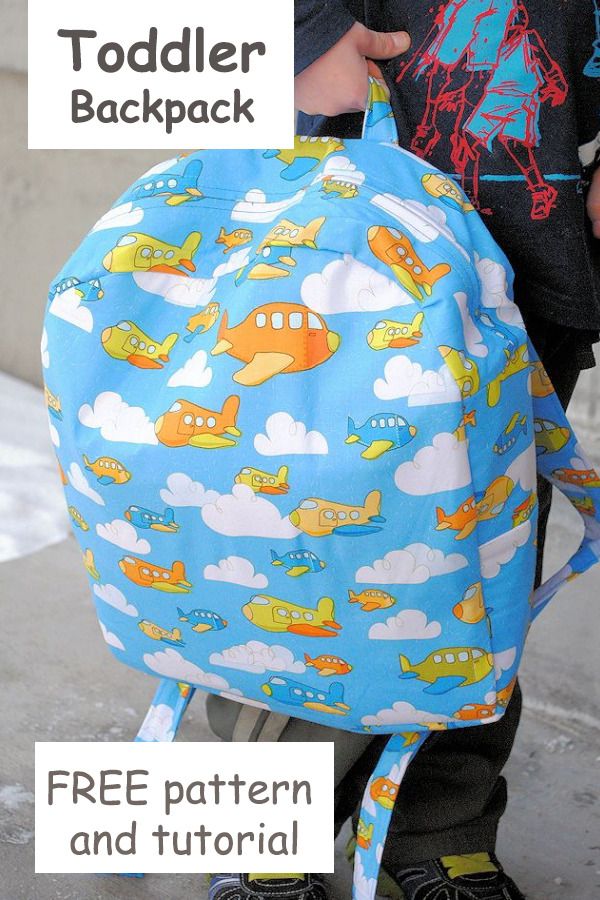 a child with a blue backpack that has airplanes on it and the words, todder backpack