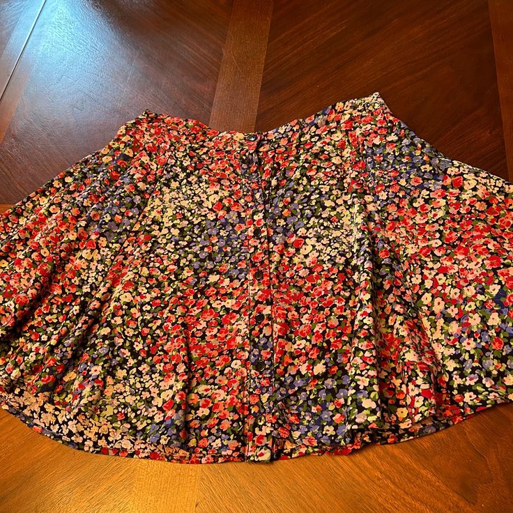 This Skirt Is New, But The Price Tag Has Been Removed. The Additional Tiny Black Button Is Still Attached. This Floral Skirt Is Not A Skirt, But Has A Black Underlay To Protect From Seeing Through. There Are Some Delicate Tiny Black Buttons All The Way Up The Skirt In The Front, And It Is Pleated. Comes From A Smoke Free Home Top Of The Waistband To The Bottom Of The Skirt Is 15 Inches.Size Is S-P. But Not Sure That Means Petite. My Daughter Is A Small But She’s Not A Petite Urban Outfitters Skirt, All The Way Up, Black Button, Price Tag, My Daughter, Floral Skirt, Urban Outfitters, The Way, Womens Skirt