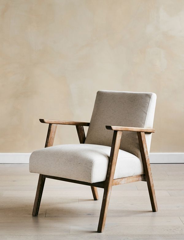 a chair sitting on top of a hard wood floor