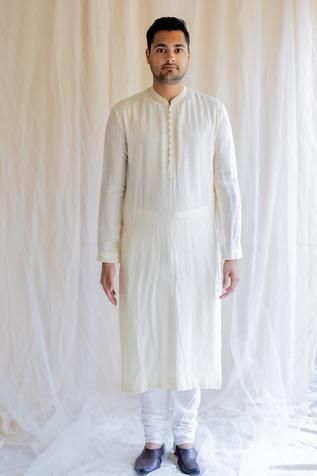 Shop for Nirjara White Embroidered Silk Kurta for Men Online at Aza Fashions White Naqshi Kurta For Festive Occasions, White Chanderi Traditional Wear With Naqshi, White Traditional Wear With Naqshi On Straight Kurta, Designer Naqshi White Kurta, White Traditional Wear With Naqshi Embroidery, White Straight Kurta With Naqshi Details, White Straight Kurta With Naqshi, White Kurta With Naqshi For Eid, Festive White Kurta With Naqshi Detailing