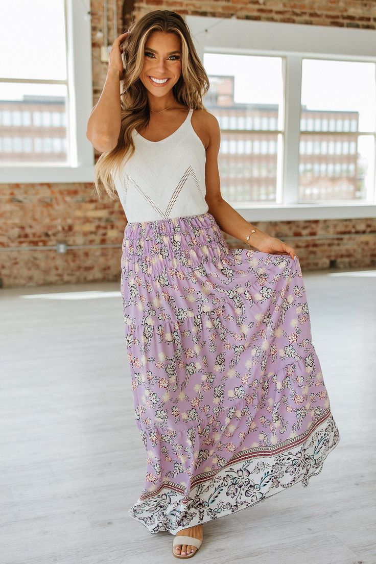 Embrace your wild side with Gibson's Floral Print Maxi Skirt! Designed with a vibrant floral pattern, this skirt will make a statement wherever you go. Its lightweight fabric allows for comfortable movement, making it perfect for any occasion. Be ready to turn heads and feel confident in this must-have addition to your wardrobe. Material:100% Polyester Model info: Models are 5'7", Size 2, wearing smalls Flowy Floral Rayon Maxi Skirt, Floral Print Tiered Maxi Skirt In Rayon, Tiered Maxi Skirt With Floral Print, Rayon Floral Print Tiered Maxi Skirt, Floral Print Rayon Tiered Maxi Skirt, Beach Floral Print Rayon Maxi Skirt, Flowy Rayon Maxi Skirt With Floral Print, Floral Print Rayon Midi Skirt, Flowy Floral Print Rayon Skirt