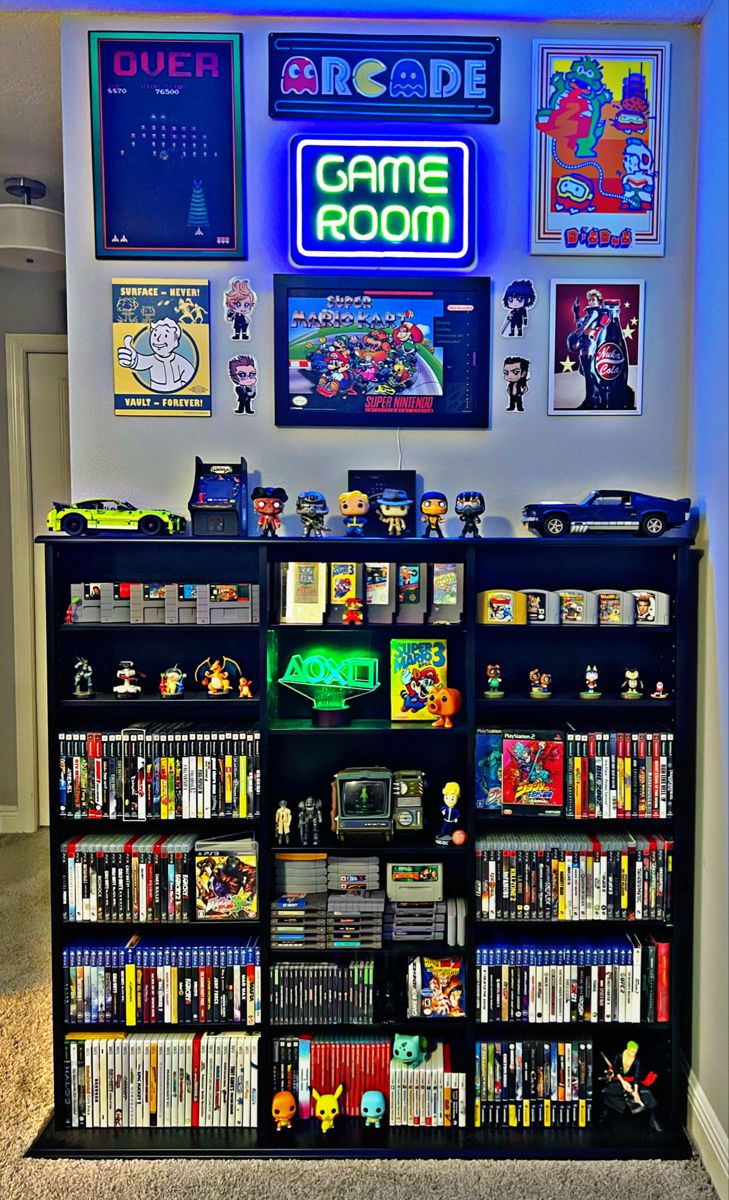 Video Game Display, Game Room, Video Games Video Game Display Shelves, Video Game Living Room Ideas, Video Game Shelf Ideas, Video Game Area In Living Room, Game Room Display Shelves, In Home Game Room, Gaming Movie Room, Home Video Game Room, Gaming Room Storage