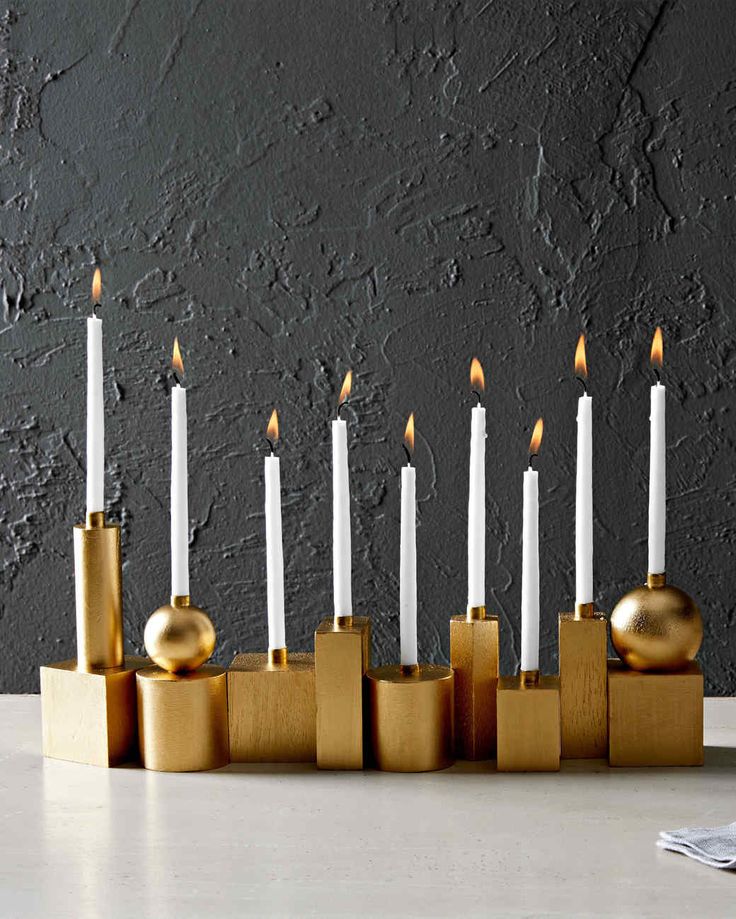 a group of candles sitting on top of a table