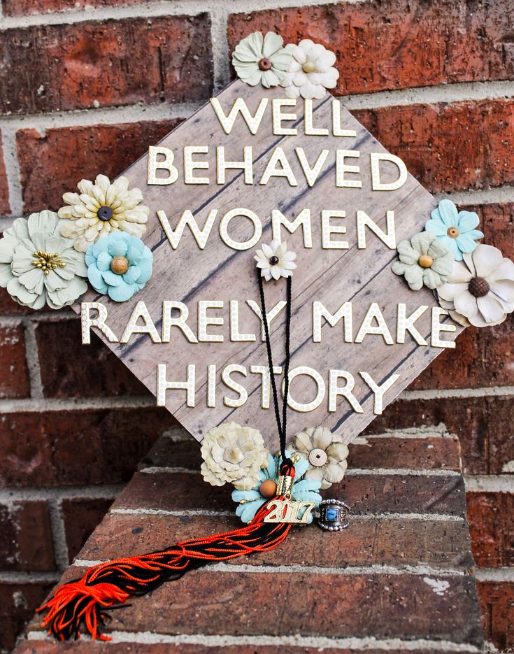 a graduation cap with flowers on it that says well behaved women rare make history