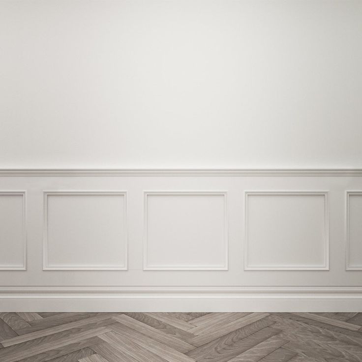 an empty room with white walls and wood flooring on the parqueted wooden floor