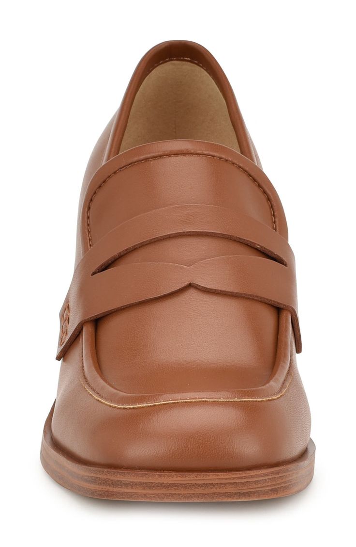 A classic penny keeper and loafer-inspired topline add modern sophistication to a polished pump framed by a squared moc toe and stacked block heel. 2" heel Synthetic upper/textile and synthetic lining/synthetic sole Imported Classic Brown Platform Loafers With Low Heel, Classic Office Loafers With Padded Heel, Brown Block Heel Platform Loafers For Work, Brown Platform Loafers With Block Heel For Work, Classic Loafers With Stacked Heel And Square Toe, Classic Platform Loafers With Block Heel For Office, Brown Platform Loafers With Block Heel For Formal Occasions, Classic Block Heel Loafers For Office, Brown Stacked Heel Loafers For Work