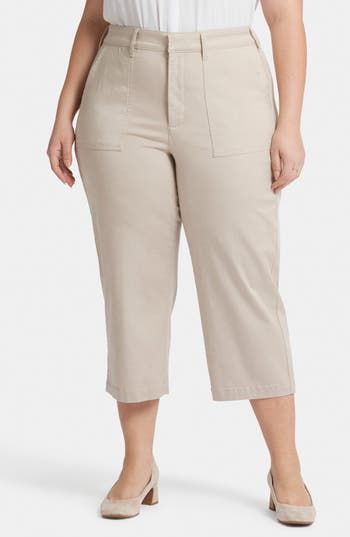 Show up to the office in polished style with these versatile pants boasting deep pockets thanks to their workwear influence. Exclusive Lift Tuck® Technology smoothes and supports in front and lifts in back. 23" inseam; 20" leg opening; 13 1/4" front rise; 20" back rise Zip fly with hook-and-bar closure Front slant patch pockets; back patch pockets 62% Tencel® lyocell, 36% cotton, 2% elastane Tencel lyocell is a sustainably produced fiber made with closed-loop processing Machine wash, dry flat Im Relaxed Fit Office Bottoms With Pockets, Utility Cropped Leg Bottoms For Workwear, Cropped Leg Cargo Pants With Patch Pockets For Work, Cropped Leg Work Pants With Pockets For Fall, Fall Cropped Leg Work Pants With Pockets, Ankle-length Work Pants With Pockets, Office Work Pants With Pockets And Tapered Leg, Workwear Cropped Cargo Pants With Belt Loops, Cropped Cargo Pants With Belt Loops For Work