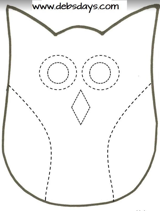 an owl mask with the outline cut out