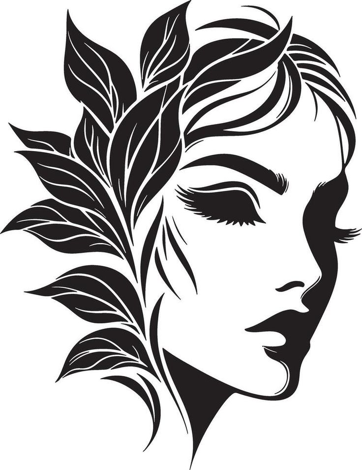 a woman's face with leaves in her hair