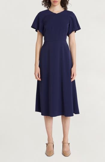 A desk-to-dinner dress is rendered in classic navy and fixed with fluttering sleeves for a dash of added charm. 47 1/2" length Hidden back-zip closure Jewel neck Short sleeves 100% polyester Machine wash, tumble dry Imported Blue Flutter Sleeve Midi Dress For Evening, Blue Formal Dresses With Cape Sleeves, Blue Formal Dress With Cape Sleeves, Chic Blue Dresses With Cape Sleeves, A-line Midi Dress With Draped Sleeves For Formal Occasions, Navy Short Sleeve Midi Dress For Party, Elegant Blue Midi Dress With Pleated Sleeves, Classic Blue Short Sleeve Midi Dress, Blue A-line Dress With Pleated Sleeves