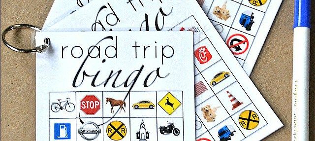 two cards that say road trip fund and are next to a pencil