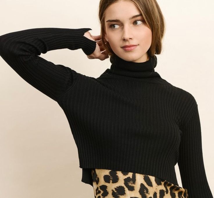 This crop top turtleneck can easily be worn over a slinky dress or a pair of denim. Long sleeve Featuring side-slit details Fold-over turtleneck Crop length Lightweight 54% Polyester, 20% Acrylic, 6% Wool Offered in Sizes: S, M, L Cropped Turtleneck Sweater Outfit, Raw Fashion, Turtleneck Sweater Outfit, Sweater With Turtleneck, Crop Turtleneck, Cropped Turtleneck Sweater, Cropped Turtleneck, Slinky Dress, Boutique Style Outfits