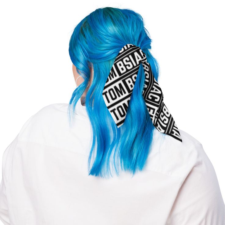 a woman with blue hair wearing a bandana