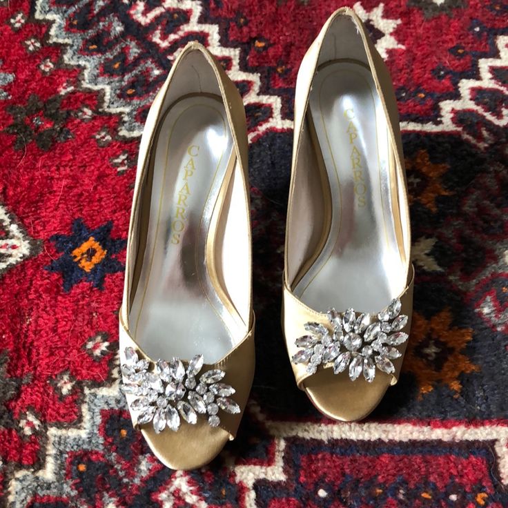 Picked These Stunners Up For My Wedding. Never Ended Up Wearing Them. Amazing. Gold Satin. Silver Fitted Heels For Wedding, Classic Gold Heels For Wedding, Elegant Embellished Shoe Clips For Wedding, Gold Pointed Toe Shoe Clips For Wedding, Glamorous Silver Heels For Anniversary, Silver Glamorous Wedding Shoes, Silver Glamorous Fitted Wedding Shoes, Gold High Heel Shoe Clips For Formal Occasions, Silver Fitted Embellished Wedding Shoes