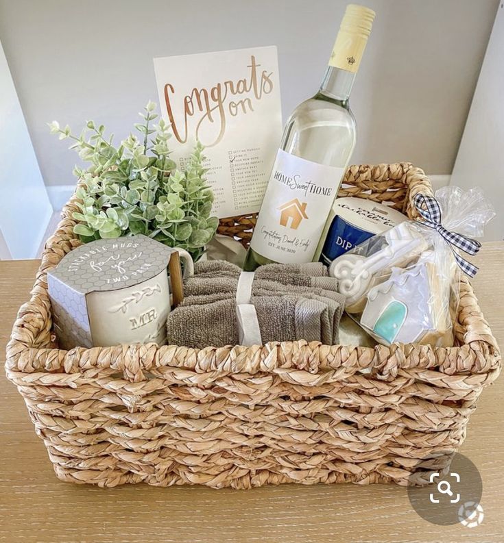 a wicker basket filled with personal care items and a bottle of wine sitting on a table