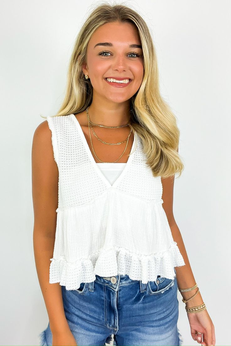 Details:Add a touch of flirty fun to your wardrobe with our V-Neck Ruffle Tank Top! Featuring a playful v-neck and delicate ruffle details, this top is perfect for any occasion. Pair it with your favorite jeans or a skirt for a stylish and whimsical look.- V-neck - Ruffle trim - Bandeau not included Content: SELF: 65% POLYESTER, 25% RAYON, 10% SPANDEX CONTRAST: 100% COTTONSize + Fit: Model is 5'8" and is wearing a size Small- Measurements from a size Small- Full length: 18"- Waist: 40"- Chest: 3 Ruffle Tank Top, School Clothes, Leggings Casual, Crop Top Sweater, Crop Top Blouse, Dope Outfits, Neck Ruffle, Outfit Goals, Shop Maxi Dresses