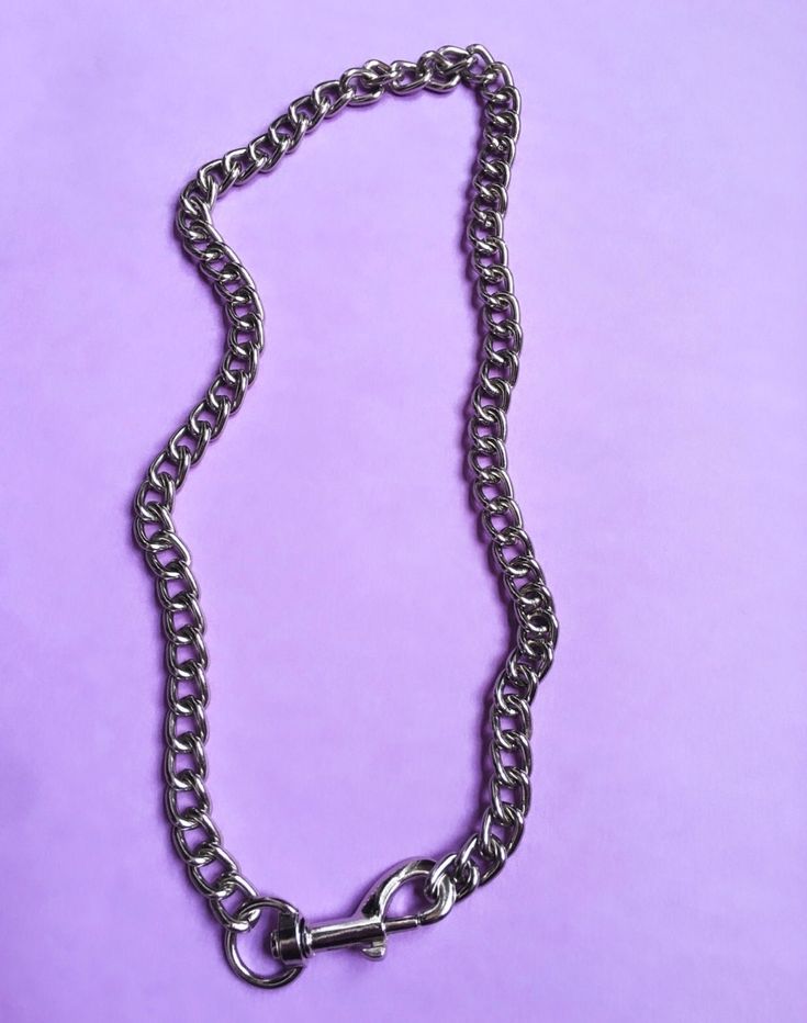 My take on Stevo's iconic necklace from SLC Punk. Crafted in iron chain with a statement lobster clasp just like the ones that make up Stevo's necklace. DIMENSIONS: Neck girth 20.5in Gunmetal Chain Link Necklace, Trendy Metal Necklace With Lobster Clasp, Metal Link Choker With Chunky Chain, Metal Link Choker With Lobster Clasp, Metal Chain Link Choker With Lobster Clasp, Metal Chain Necklace With Lobster Clasp For Party, Party Chain Necklace With Lobster Clasp In Metal, Party Metal Chain Necklace With Lobster Clasp, Silver Chain Choker In Grunge Style