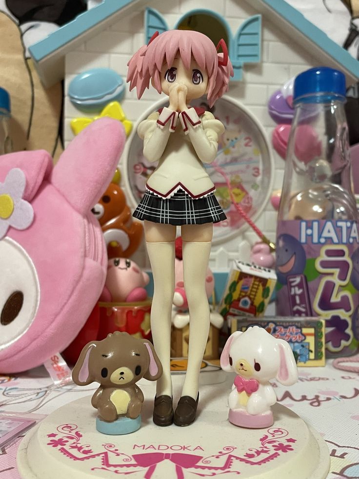 a close up of a figurine on a table with toys in the background