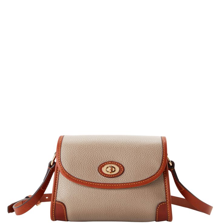 One inside zip pocket. One inside slip pocket. Inside key hook. Adjustable strap. Detachable strap. Lined. Turnlock closure. Duck Bag, Clothes Wishlist, Monogram Pendant, Tan Cowhide, Key Hook, Black Polish, Credit Card Wallet, Dooney And Bourke, Dooney & Bourke