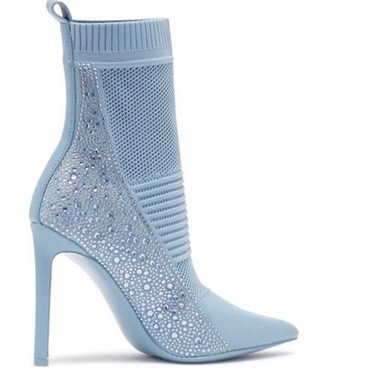 Product Details Shaft Height: Ankle Shaft Circumference: 8.75 Inches About This Item * Steve Madden * Ribbed Fly Knit Bootie * Tall Ankle Boot With Pointed Toe * Stiletto Heel * Rhinestone Heel Detail 1 Day Shipping Chic Light Blue Boots With Round Toe, Chic Light Blue Round Toe Boots, Chic Blue High Ankle Heeled Boots, Blue Fitted Ankle Heeled Boots, Fitted Blue Ankle Heeled Boots, Fitted Light Blue Pointed Toe Boots, Blue Ankle Heeled Boots For Spring, Chic Blue Ankle-high Heeled Boots, Light Blue Pointed Toe Boots For Fall