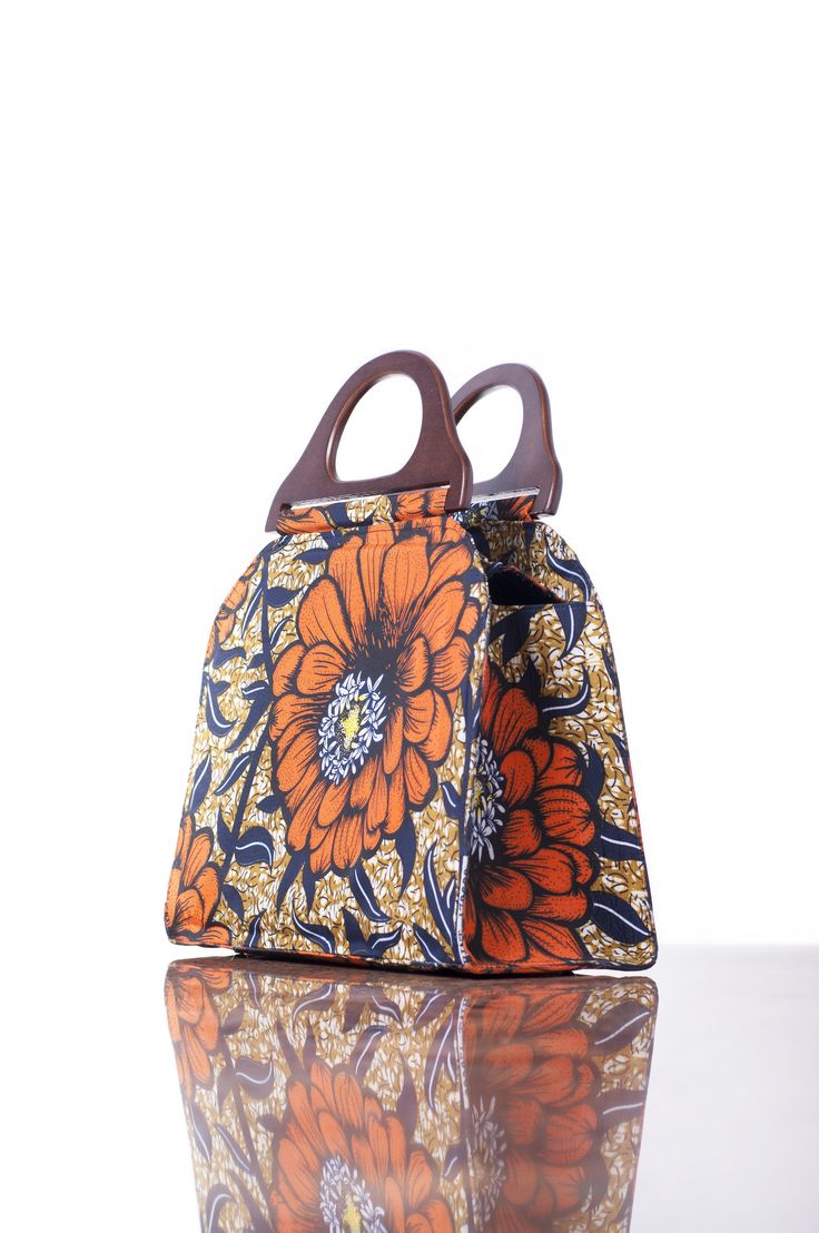 Introducing the Fara satchel! For those days where work needs to get done or you simply need more room, the Fara satchel is there for you. Its warm colors are perfect for every season and a perfect way for you to Rock Your Etniciti ! Ankara Bags, For Keeps, Side Bag, Side Bags, Those Days, Formal Style, Satchel Bag, Orange Flowers, Warm Colors