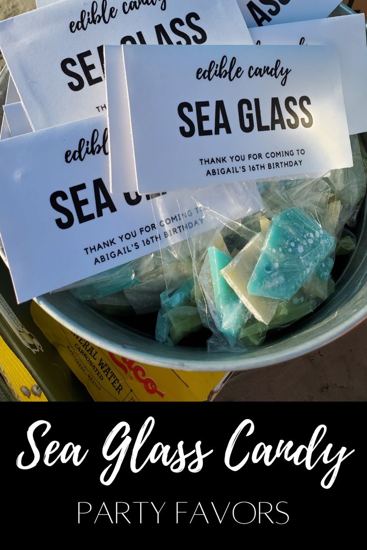 sea glass candy party favors in a bucket with the words sea glass candy on it