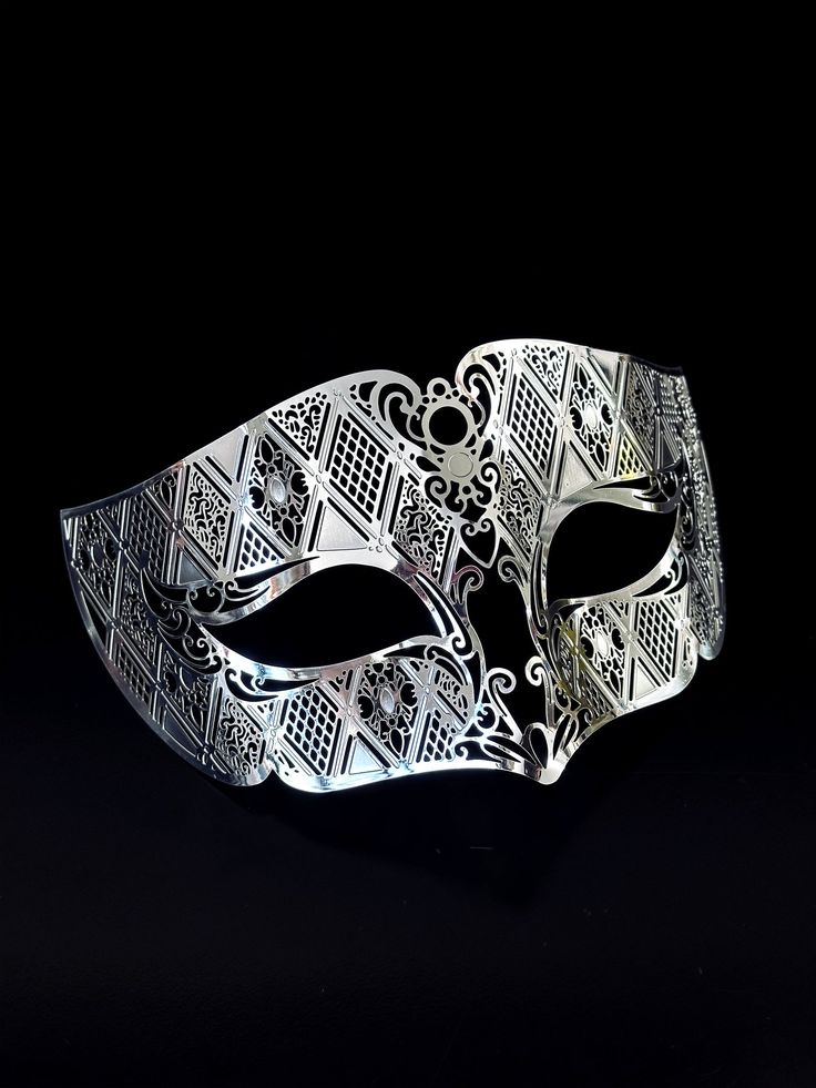 Our laser-cut metal mask boasts a stunning silver finish that shines and shimmers, ensuring you stand out in any crowd. Crafted with your comfort in mind, our mask is lightweight and easy to wear for hours on end.


Age Group/Gender - Adult/Men

Size/Type - One size fits all adults

Mask Color - Silver

Mask Material - Laser cut metal Masquerade Mask Men, Masquerade Men, Mens Masquerade Mask, Mask Men, Silver Mask, Metal Mask, Half Mask, Laser Cut Metal, Masks Masquerade