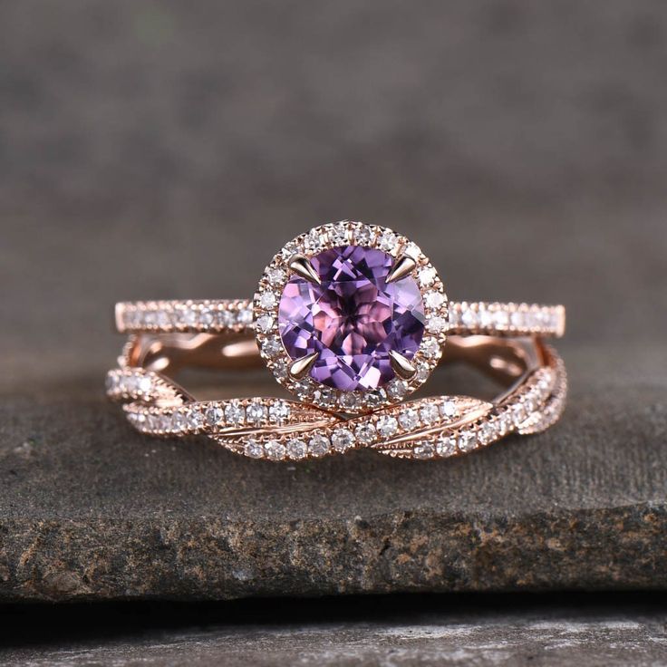 This is a amethyst and cubic zircon ring set in 925 sterling silver. This ring is marked 925 Engagement ring: 7mm round cut natural amethyst, side stone is CZ. Wedding band: full eternity CZ. I accept custom making order.Please contact me if you need this service. All the jewelry in my store is handmade.It may take 2-3 weeks to finish. For all the jewelries,there is a 14 days money back guarantee.You can return it in the time frame without any questions.However there maybe handcrafted fee and sh Purple Wedding Rings, Emerald Wedding Rings Set, Purple Engagement Rings, Cz Wedding Ring Sets, Amethyst Wedding Rings, Opal Engagement Ring Set, Amethyst Engagement Ring, Anniversary Ring Set, Amethyst Wedding