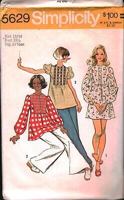 an old sewing pattern for women's tops and pants