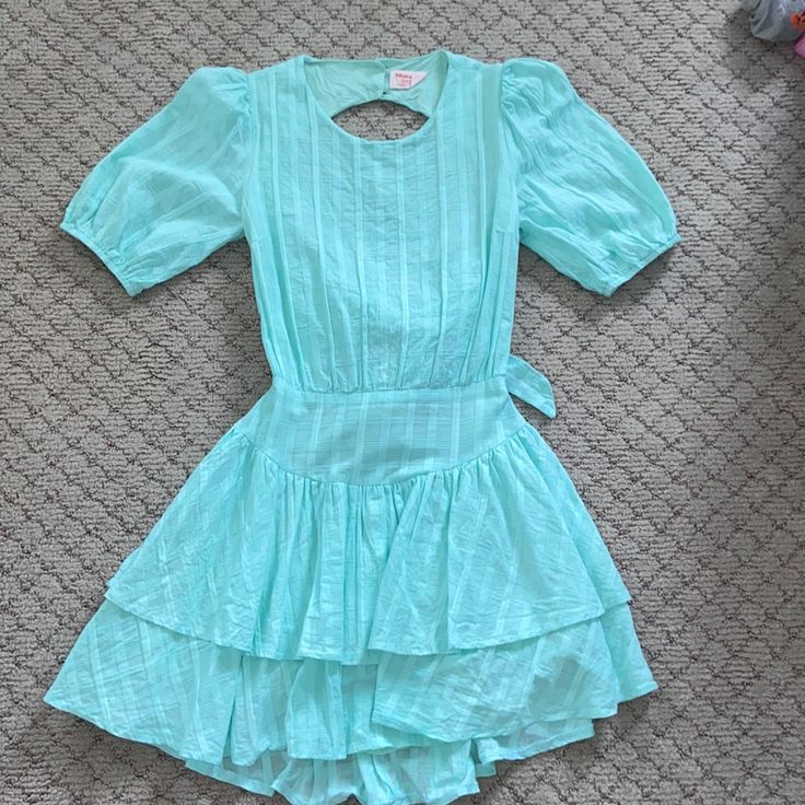 Perfect Condition, Looks Like Love Shack Fancy Light Blue Knee-length Dress With Ruffle Hem, Blue Dresses With Ruffle Hem For Dress Down, Blue Dresses With Ruffle Hem For Casual Wear, Light Blue Sundress With Ruffle Hem, Blue Ruffle Hem Dress For Brunch, Cute Blue Knee-length Dress, Light Blue Ruffle Hem Dress For Day Out, Cute Short Sleeve Dress For Brunch, Chic Light Blue Dress For Garden Party