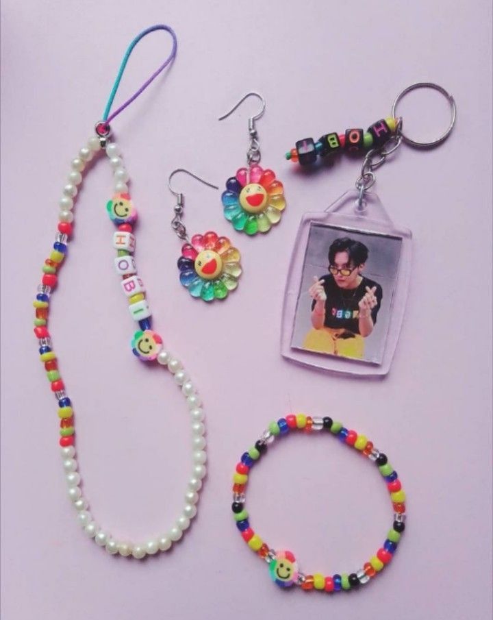 the necklaces and bracelets are all made up of plastic beads with charms on them