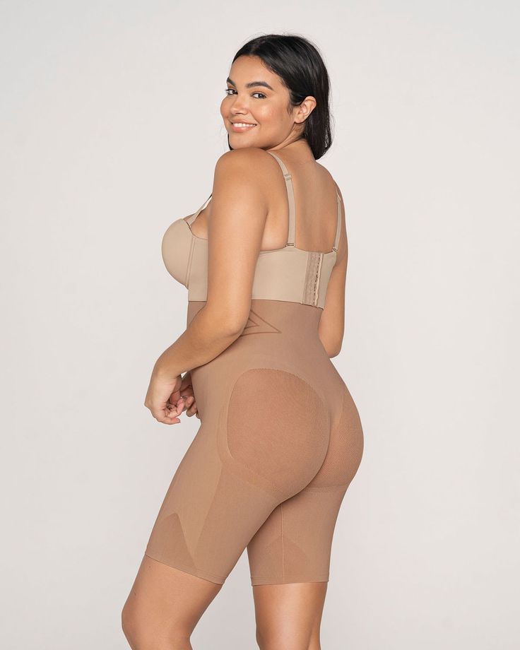 Slip into seamless shaping! This shaper short is made of our signature SkinFuse® fabric for moderate compression to shape your entire torso. Sheer mesh cutouts and a thong effect in the back offer a natural butt lift without flattening. Special seams create an hourglass effect. This shaper comes with straps, but you can also wear it strapless. Features an open bust, “wear your own bra” design. You can wear this shaper under dresses and skirts to prevent chafing, or under pants and trousers for s Bra Design, Waist Shapewear, Open Bust, Slip Shorts, Everyday Bra, Under Dress, Body Shapers, Two Piece Pant Set, Trousers