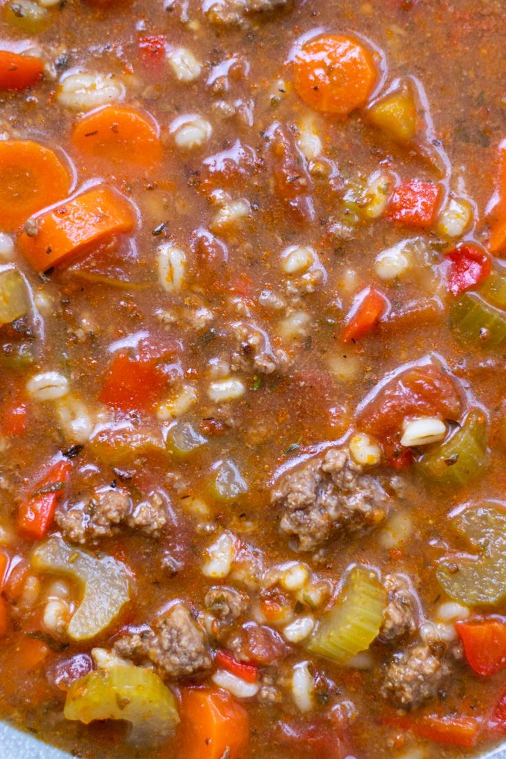 a bowl filled with meat and vegetable soup