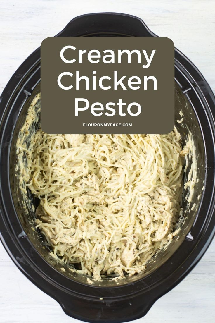 creamy chicken pesto in a slow cooker with text overlay that reads creamy chicken pesto