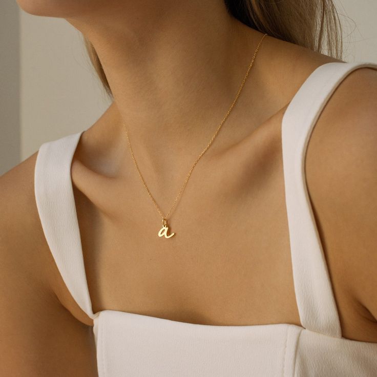 No need to spell it out — Wear your initial, your bestie’s, or your pet’s with this understated necklace. A playful take on a youthful Parisian inspired font, the Nella Letter Necklace is perfect for layering for a personalized, elevated look. Material: High Quality Solid 925 Sterling Silver Finish: Sterling Silver ∙ 18K Gold ∙ Rose Gold Featuring 8 - 10mm Initial Pendant SKU: MM-NM13F101 Everyday Charm Necklaces With Letter Beads, Trendy Personalized Initial Pendant Necklace, Everyday Initial Necklace With Letter Beads, Trendy Initial Pendant Charm Necklaces For Everyday, Trendy Everyday Initials Name Necklace, Everyday Trendy Initials Name Necklace, Trendy Personalized Initial Necklace For Everyday, Minimalist Initial Necklace With Letter Beads, Mother's Day Initial Pendant Necklace With Letter Beads