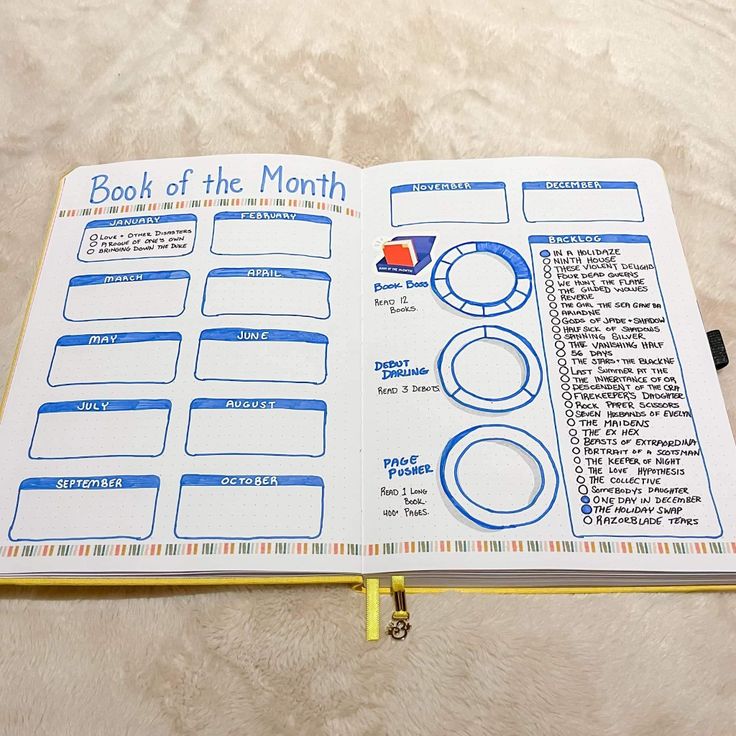 an open planner with blue and white pages