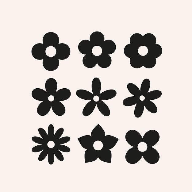 black and white flowers are arranged in the shape of four petals, with one flower at the center